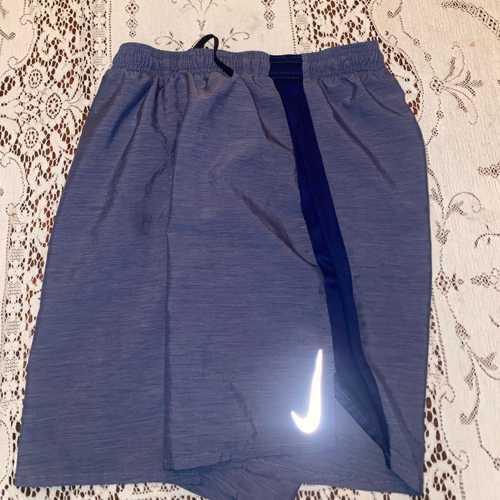 Blue Nike shorts